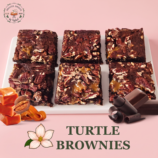 Soulful Sweets by Rafael decadent chocolate brownies topped with gooey caramel and crunchy pecans on a white plate.